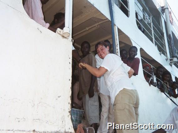 Barbara Climbs Aboard the Ferry, Malawi