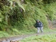 Barbara walks through the waterfall