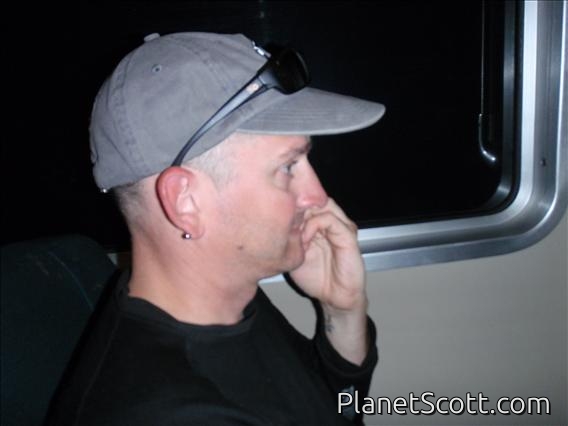 Scott is sure we will miss our flight (but it is delayed and we have to wait)
